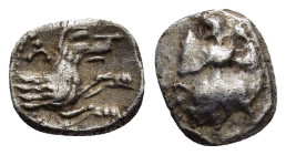 LYCAONIA.Laranda.( Circa 324-323 BC).Obol.

Obv : Λ.
Forepart of a wolf to right.

Rev : Baaltars seated left, holding grain ear, grapes, and sceptre....