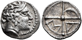 SOUTHERN GAUL. Uncertain tribe. Circa 2nd century BC. Obol (Silver, 9 mm, 0.55 g, 12 h). Bare head of Apollo to right. Rev. Wheel of four spokes with ...