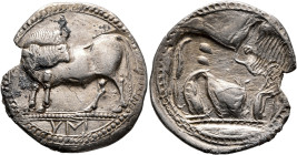 LUCANIA. Sybaris. Circa 550-510 BC. Nomos (Silver, 30 mm, 7.58 g, 11 h). VM Bull standing to left on dotted ground line, head turned back to right; al...