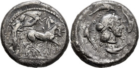 SICILY. Syracuse. Deinomenid Tyranny, 485-466 BC. Tetradrachm (Silver, 16.77 g), circa 475-470. Charioteer driving quadriga walking to right, holding ...