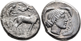 SICILY. Syracuse. Second Democracy, 466-405 BC. Tetradrachm (Silver, 25 mm, 16.80 g, 3 h), circa 450-440. Charioteer driving quadriga walking to right...
