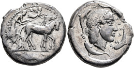 SICILY. Syracuse. Second Democracy, 466-405 BC. Tetradrachm (Silver, 27 mm, 16.86 g, 11 h), circa 450-440. Charioteer driving quadriga walking to righ...