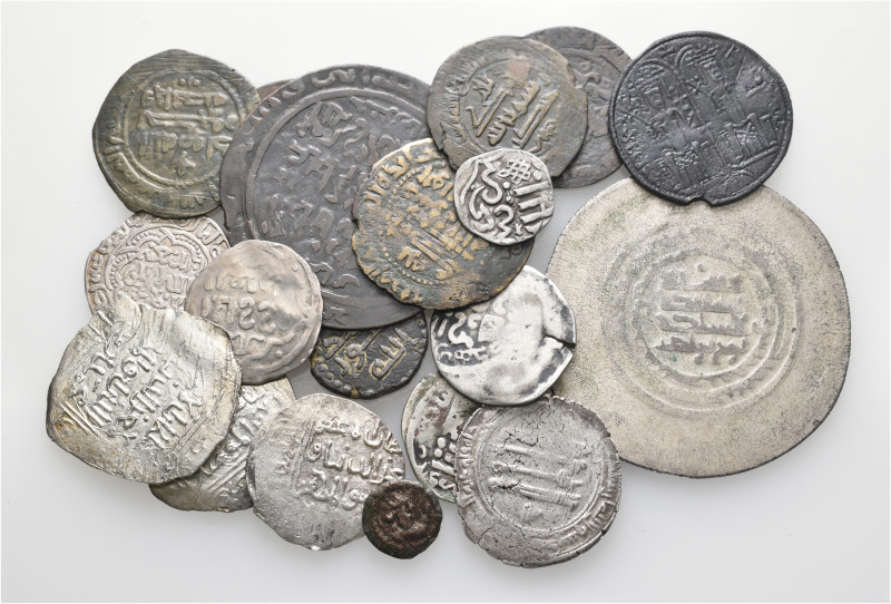 A lot containing 19 silver and bronze coins. All: Islamic. Fine to very fine. LO...