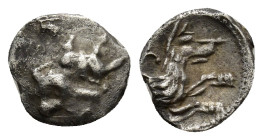 Lycaonia, Laranda, c. 324/3 BC. AR Obol (9mm, 0.64 g). Baaltars seated l., holding grain ear, grape bunch, and sceptre. R/ Forepart of wolf r.; invert...