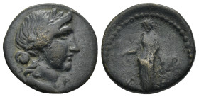 Uncertain Greek Bronze Coin AE (5.7 Gr. 20mm.)
Female head of right. 
Uncertain figure.