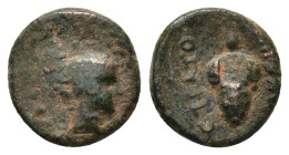 Uncertain Mint AE (1.46 Gr. 11mm.) 
Artemis head right. 
Rev. Grape bunch.