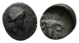 Uncertain Greek Bronze Coins (0.7 Gr. 9mm.)
Head of Apollo. 
Rev. Ram head.
