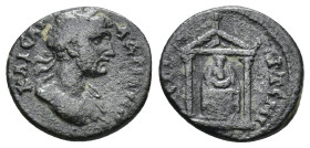 Hadrian (AD 117-138) Uncertain City. AE (2 Gr. 15mm.)
Laureate and cuirassed bust of Hadrian
Rev. Tyche seated facing within temple.