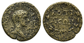 Phrygia, Cotiaeum. Diadumenian 218 AD. (?) AE (2.48 Gr. 17mm.)
Bare head right, slight drapery on left shoulder 
Rev. KOTI-AEΩ-N in three lines within...