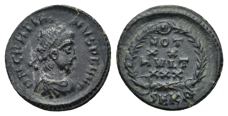 Gratian (367-383). AE (1.3 Gr. 14mm.). Cyzicus. 
 Pearl-diademed, draped and cui...