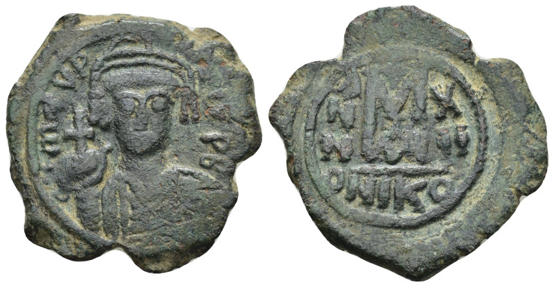 Maurice Tiberius. AD 582-602. Nikomedia Follis AE (9.97 Gr. 31mm.). 
Helmeted an...