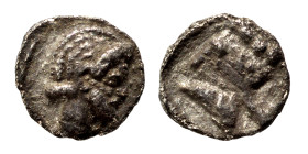 GREEK. Uncertain. Circa 4-5th century BC. Hemitetartemorion (silver, 0.11 g, 5 mm). Male head right. Rev. - . Nearly very fine.