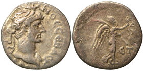 Hadrian, 117-138. Hemidrachm (silver, 1.12 g, 13 mm), Cappadocia. Caesarea. Laureate, draped and cuirassed bust right. Rev. Nike advancing right, hold...