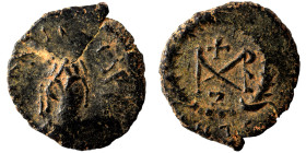 Marcian, 450-457. Nummus (bronze, 0.92 g, 12 mm), Antioch. D N MARCIANVS P F AV or similar, diademed, draped and cuirassed bust right. Rev. Monogram i...