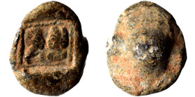 ROMAN. Circa 3rd century. Seal (lead, 3.21 g, 14 mm). Male and female bust facing each other. Rev. Blank. Nearly very fine.