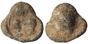 ROMAN. Circa 3rd century. Seal (lead, 2.44 g, 13 mm). Two busts facing. Rev. Blank. Nearly very fine.