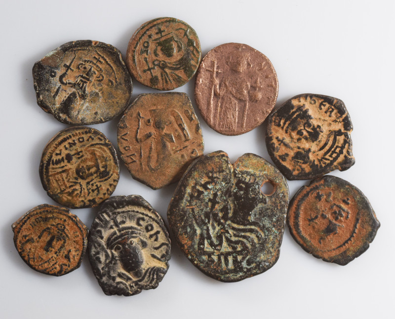 10 Byzantine coins. F-VF. As seen, no return.