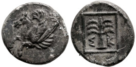 Greek
TROAS. Skepsis (Circa 400-310 BC)
AE Bronze (12m 1.2g)
Obv: Rhyton with forepart of Pegasos left
Rev: Σ-Κ Palm tree; all within linear squar...