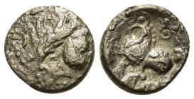 Celtic. Eastern Europe, c. 3rd century BC. AR Drachm (13,7mm, 1.8g). Imitating the types of Philip II of Macedon. Celtised laureate head r. R/ Celtise...