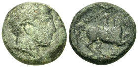 Kings of Macedon, Philip II (359-336 BC). Æ Unit (18mm, 6.85g). Uncertain mint in Macedon. Diademed head of Apollo r. R/Youth on horseback riding r.; ...