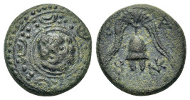 Kings of Macedon, Alexander III (336-323 BC). Æ (16mm, 4g). Salamis, c. 323-315 BC. Macedonian shield with gorgoneion in boss. R/ Crested helmet; cadu...