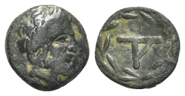 Thessaly, Peumata, c. 302-286 BC. Æ Chalkous (12.5mm, 1.72g, 9h). Wreathed head of Achilles r. R/ Ethnic around AX monogram; Phrygian helmet to r. Rog...