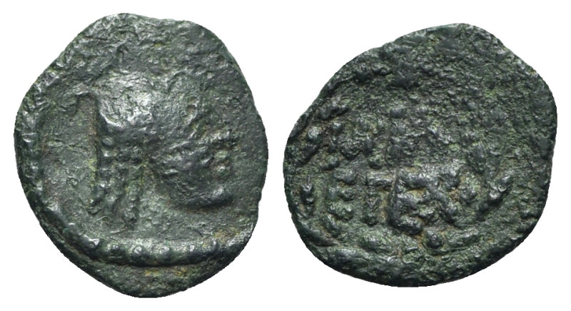 Uncertain mint, c. 3rd-1st century BC. Æ (15mm, 1.22g, 10h). Head r. R/ Legend w...