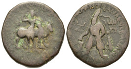 India, Kushan Empire. Vima Kadphises (90-100). Æ Tetradrachm (27,2mm, 17.9 g). King standing l., sacrificing at altar; trident before; tamgha in field...
