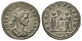 Probus (276-282). Æ Radiate (22mm, 2.6g). Siscia, AD 278. Radiate and cuirassed bust r. R/ Female figure standing r., presenting wreath to emperor who...