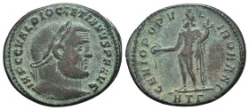 Diocletian (284-305). Æ Follis (29mm, 10.25g, 12h). Heraclea, c. 296-7. Laureate head r. R/ Genius standing l., holding patera and cornucopiae; HTΓ. R...