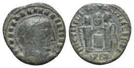 Barbaric issue, imitating Constantine I, c. 4th-5th century. Æ (17mm, 2.65g, 12h). Laureate, helmeted and cuirassed bust r. R/ Two victories standing ...