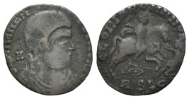 Magnentius (350-353). Æ (19mm, 1.83g, 6h). Imitation of Lugdunum. Bare-headed, draped and cuirassed bust r. R/ Soldier standing l., spearing fallen ho...
