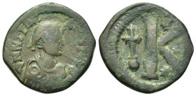 Justin I and Justinian I (527-565). Æ 20 Nummi (25,5mm, 8.35g). April-August 527 AD. Laureate, draped and cuirassed bust r.; star on shoulder. R/ Larg...