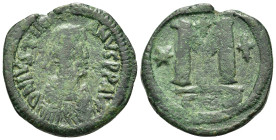 Justinian I (527-565). Æ 40 Nummi (30mm, 18g). Constantinople. Diademed, draped and cuirassed bust r. R/ Large M flanked by star and cross; in ex., CO...