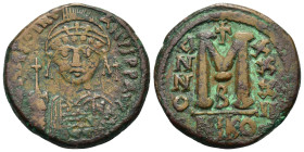 Justinian I (527-565). Æ 40 Nummi (30,5mm, 17,5g). Nicomedia, year 32 (AD 558/9). Helmeted and cuirassed facing bust, holding globus cruciger and shie...