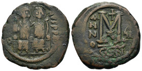 Justin II with Sophia (565-578). Æ 40 Nummi (31,2mm, 12,7g). Constantinople, year 7 (AD 571/2). Nimbate figures of Justin and Sophia seated facing on ...