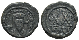 Phocas (602-610). Æ 20 Nummi (23mm, 7.20g, 7h). Carthage, year 5 (606/7). Crowned bust facing, wearing consular robes and holding mappa and cruciform ...