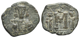 Constantine IV (668-685). Æ 40 Nummi (22mm, 3.07g, 6h). Syracuse, 674-681. Helmeted and cuirassed bust facing slightly r., wearing short beard, holdin...