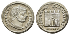 Diocletian (284-305). Replica of AR Argenteus (17mm, 2.50g). Nicomedia. Laureate head r. R/ Camp gate with four towers and star above open door. Cf. R...