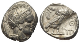 Attika. Athen.

 Tetradrachme (Silber). Ca. 454 - 404 v. Chr.
Vs: Kopf der Athena mit ölzweiggeschmücktem attischem Helm, Ohranhänger und Halskette...