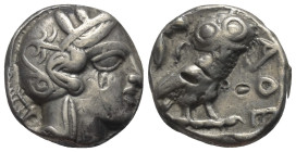 Attika. Athen.

 Tetradrachme (Silber). Ca. 454 - 404 v. Chr.
Vs: Kopf der Athena mit ölzweiggeschmücktem attischem Helm, Ohranhänger und Halskette...