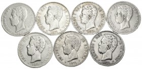 Centenario de la Peseta (1868-1931). Lote de 7 monedas de 5 pesetas de Amadeo I, 1871*71 (6), 1871*73 (1), algunas estrellas visibles. A EXAMINAR. BC-...