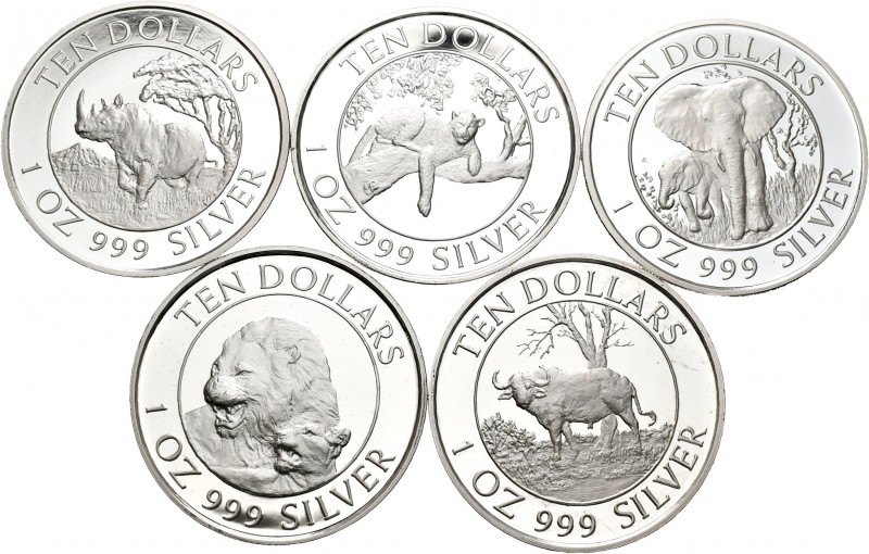 Extranjero. Lote de 9 monedas modernas de plata de distintos países africanos, Z...