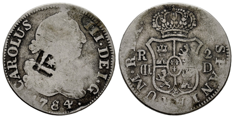 Carlos III (1759-1788). 2 reales. 1784. 4,27 g. Curiosa pieza falsa de época con...