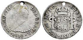 Fernando VII (1808-1833). 2 reales. 1810. Lima. JP. (Cal-809). Ag. 6,47 g. Busto indígena. Agujero. Escasa. BC+. Est...50,00.