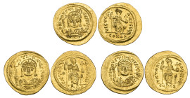 Justin II (565-578), solidi (3), Constantinople, facing bust holding globe surmounted by Victory, rev., Constantinopolis seated holding globus crucige...