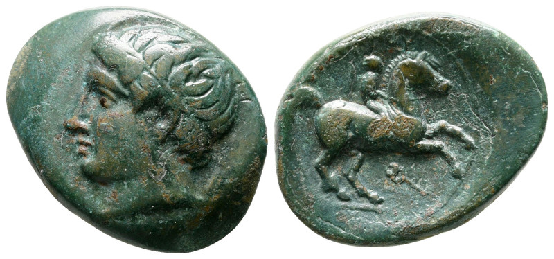 Kings of Macedon. Uncertain mint. Philip II of Macedon 359-336 BC. 
Bronze Æ
...