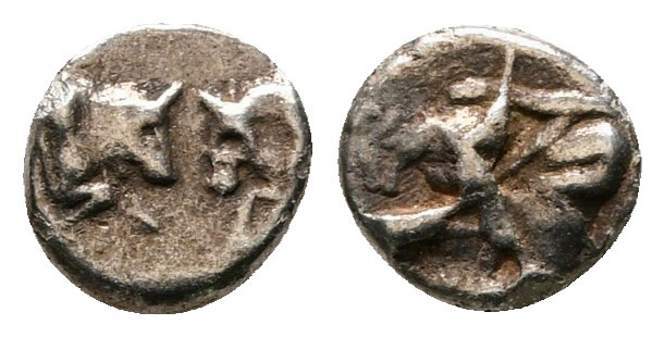 Caria. Uncertain mint circa 525-475 BC. 
Tetartemorion AR

6 mm, 0,24 g


...