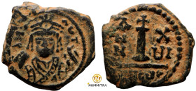 Maurice Tiberius. (582-602 AD). AE decanummium. (17mm, 3,43g) Theoupolis. Obv: bust of Maurice Tiberius facing. Rev: large I. A/N/N/O.
