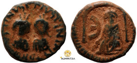 Justin I. and Justinian I. (527 AD). Pentanummium. (12mm, 1,97g) Obv: diademed busts facing. Rev: Э. Tyche seated left.